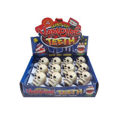 Halloween clockwork skull toys classic festival toys decoration holiday promotion 12pcs small plastic wind-up toy for promotion